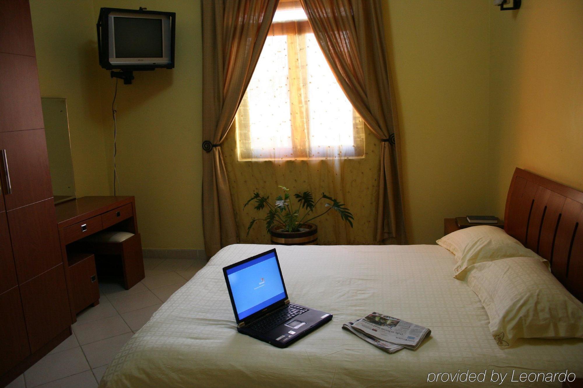 Hotel Kipepeo Найроби Номер фото