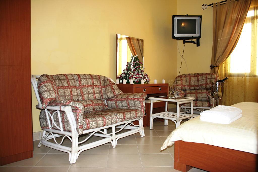 Hotel Kipepeo Найроби Номер фото